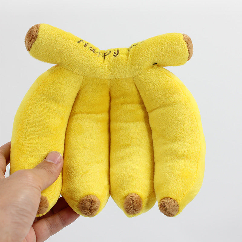Dog makes noises and chews on plush banana toys  fun and entertaining toy for dogs to relieve boredom