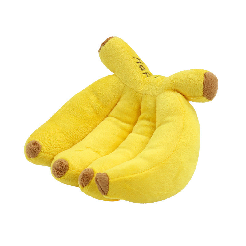 Dog makes noises and chews on plush banana toys  fun and entertaining toy for dogs to relieve boredom